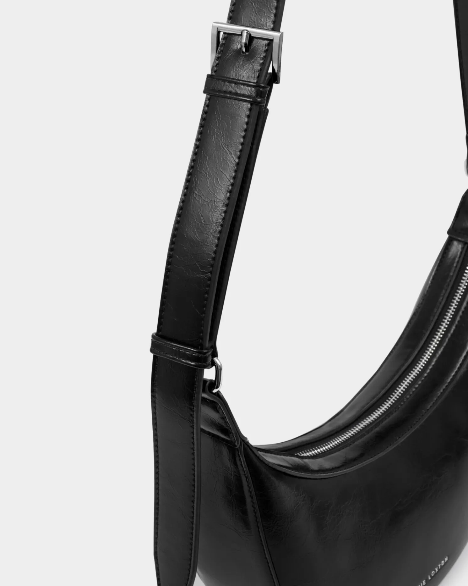 Amina Patent Crackle Sling Bag