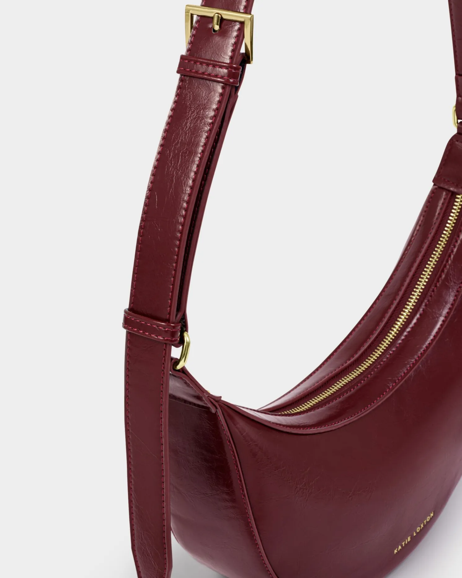 Amina Patent Crackle Sling Bag