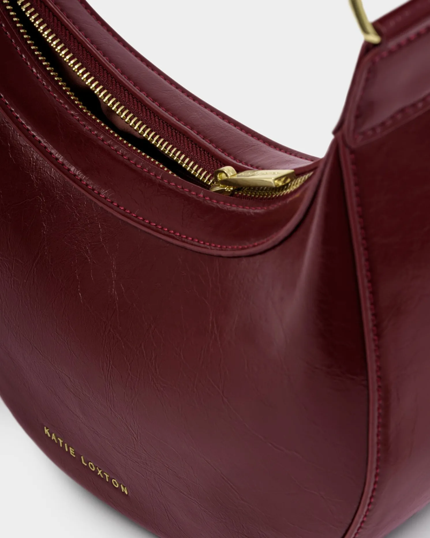 Amina Patent Crackle Sling Bag